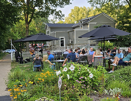 people dining outside at Vido di Luca